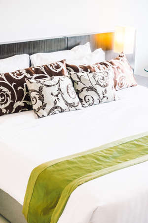 Beautiful luxury pillow on bed decoration in bedroom interior - Vintage light Filter