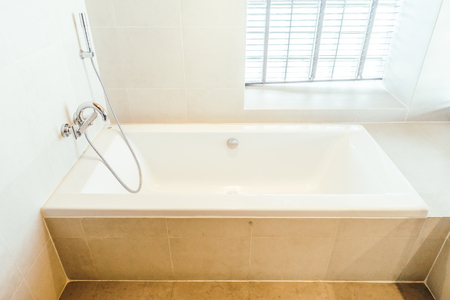 White bathtub decoration in bathroom  and toilet room interior - Vintage light Filterの写真素材