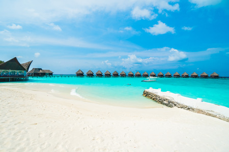 Beautiful tropical Maldives resort hotel and island with beach and sea  and coconut palm tree on sky for holiday vacation background concept - Boost up color Processingのeditorial素材