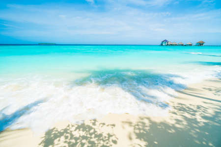 Beautiful tropical Maldives resort hotel and island with beach and sea on sky for holiday vacation background concept - Boost up color Processingのeditorial素材