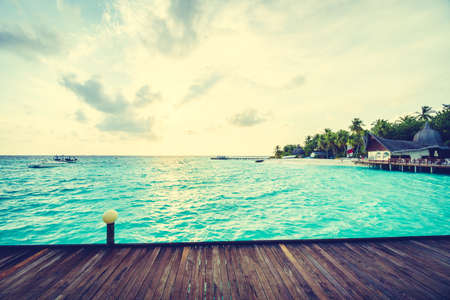 Beautiful tropical Maldives island with beach and sea for nature holiday vacation background concept - Vintage Filter and Boost up color Processingのeditorial素材