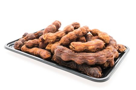 Sweet tamarind fruit isolated on white backgroundの写真素材
