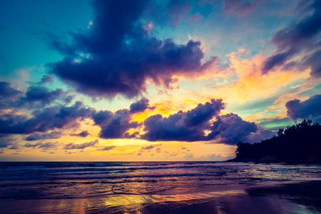 Beautiful sunset on the beach and sea with cloud and sky background - Vintage Filterの写真素材