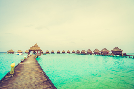 Beautiful tropical Maldives island with beach and sea for nature holiday vacation background concept - Vintage Filter and Boost up color Processingのeditorial素材