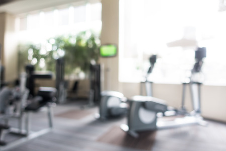 Abstract blur gym and fitness room interior for background