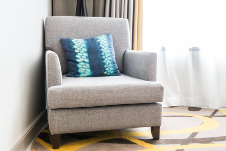 Beautiful luxury pillow on sofa decoration in living room interiorの写真素材