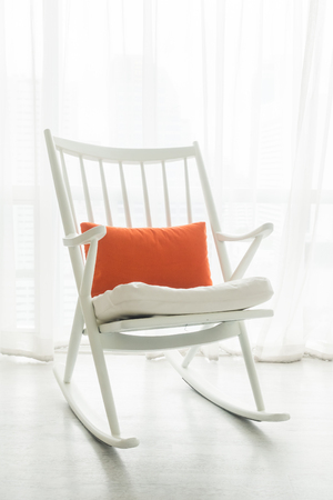 Rocking chair with pillow decoration in living room interiorの写真素材