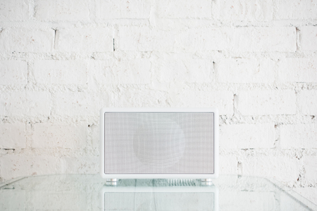 Radio for listen music with brick wall backgroundの写真素材