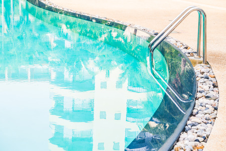 Outdoor swimming pool in hotel resort - Vintage light Filterの写真素材