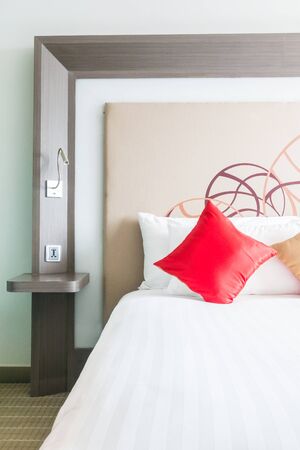 Beautiful pillow on bed decoration in bedroom interiorの写真素材