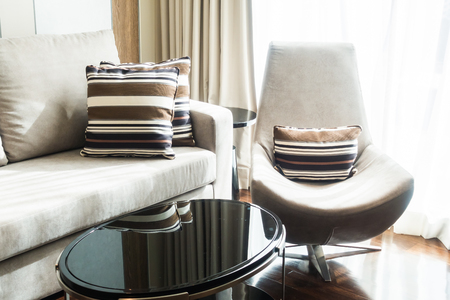 Beautiful luxury pillow on sofa decoration in living room interiorの写真素材