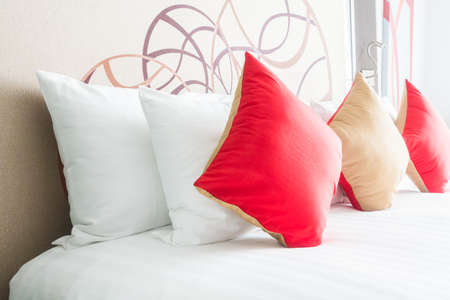 Beautiful pillow on bed decoration in bedroom interiorの写真素材