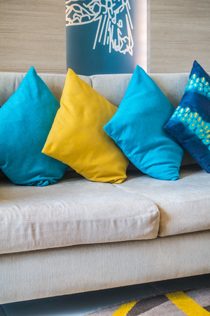 Beautiful luxury pillow on sofa decoration in living room interiorの写真素材