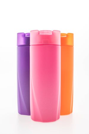 Blank cosmetic and shampoo bottle isolated on white backgroundの写真素材