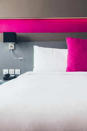 Beautiful pillow on bed decoration in bedroom interiorの写真素材