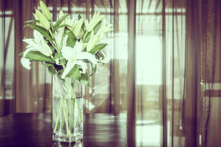 Vase flower on table decoration in room - Vintage Filterの写真素材