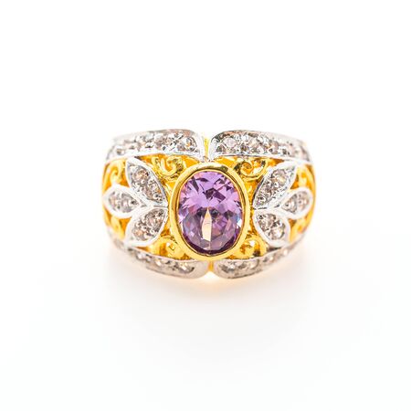 Beautiful luxury gold ring with jewelry diamond isolated on white backgroundの写真素材