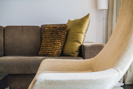 Beautiful pillow on sofa decoration in living room interiorの写真素材