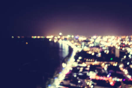 Abstract blur beautiful pattaya city and bay at night for background - Vintage Filterの写真素材