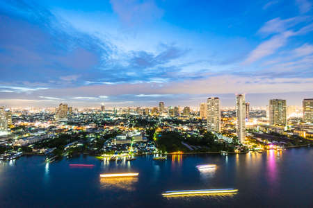 Beautiful architecture in bangkok city skyline at night around chao phraya river in Thailand