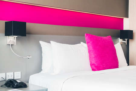 Beautiful pillow on bed decoration in bedroom interiorの写真素材