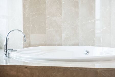 Beautiful luxury white bathtub decoration in bathroom interiorの写真素材
