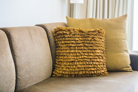 Beautiful pillow on sofa decoration in living room interiorの写真素材