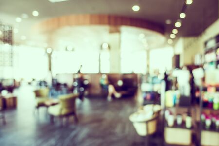 Abstract blur luxury coffee shop cafe interior for backgroundの写真素材