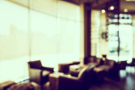 Abstract blur luxury coffee shop cafe interior for backgroundの写真素材