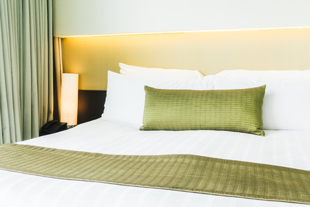 Beautiful pillow on bed decoration in bedroom interiorの写真素材