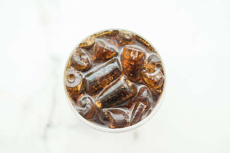 Selective focus point Iced cola glass in restaurantの写真素材