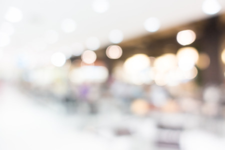 Abstract bokeh and blur beautiful luxury shopping mall and retails store interior for backgroundの写真素材