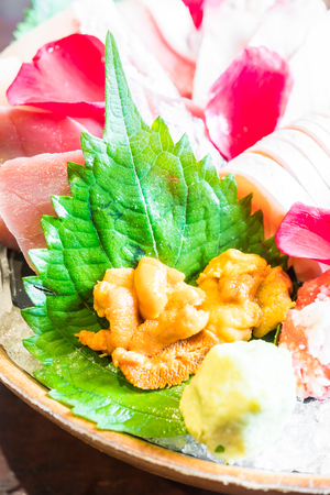 Selective focus point and Close up on Sashimi seafood set , Japanese and Healthy food - Dark Processing and Vignetting Effectの写真素材