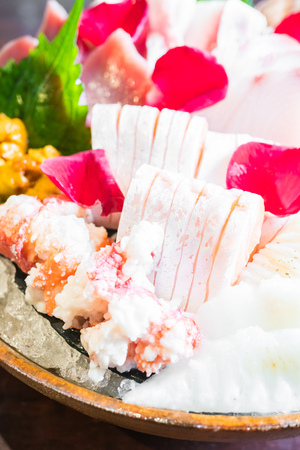 Selective focus point and Close up on Sashimi seafood set , Japanese and Healthy food - Dark Processing and Vignetting Effectの写真素材