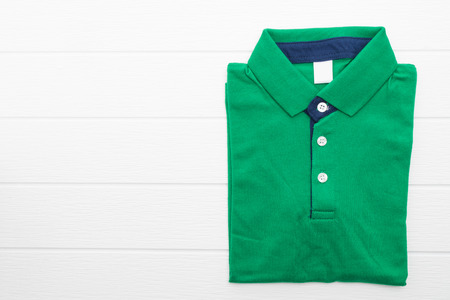 Shirt and Clothes on white wooden backgroundの写真素材