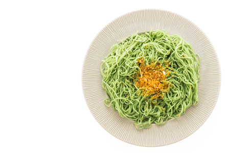Green or Jade noodles in plate isolated on white backgroundの写真素材
