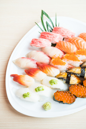Raw fresh salmon , fish , shrimp , and more Sushi in white plate - Japanese food styleの写真素材