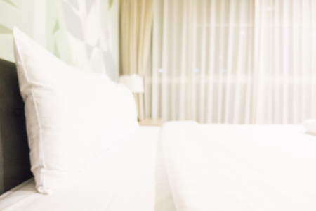 Abstract blur hotel bedroom interior for backgroundの写真素材