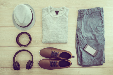 Top of view fashion set for men with Sweater Hat Headphone Shoes and Smart moblie phone - Vintage Filter Processingの写真素材
