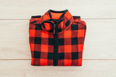 Beautiful men fashion fleece jacket for clothing on wooden background - Vintage Light Filterの写真素材