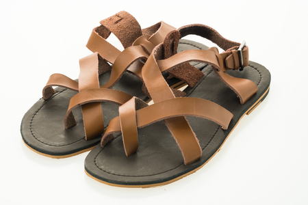 Men leather sandal and flip flop shoes isolated on white backgroundの写真素材