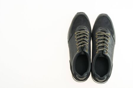 Beautiful black leather shoes for men isolated on white backgroundの写真素材