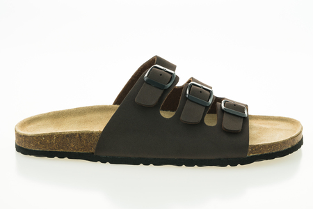 Men leather sandal and flip flop shoes isolated on white backgroundの写真素材