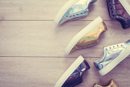 Fashion shoes and sneaker on wooden background - Vintage Filterの写真素材