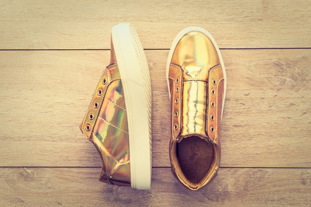 Fashion shoes and sneaker on wooden background - Vintage Filterの写真素材