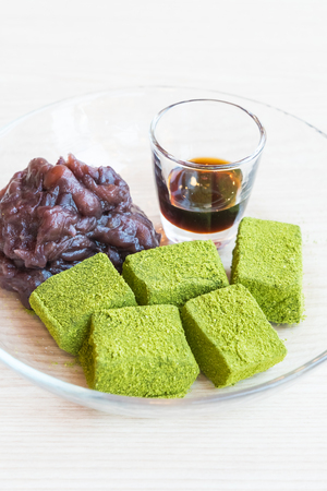 Moji green tea with red bean and sweet sauce dessertの写真素材