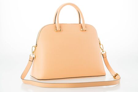 Beautiful elegance and luxury fashion women bag isolated on white backgroundの写真素材