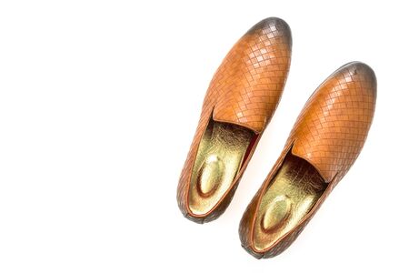 Brown leather shoes isolated on white backgroundの写真素材