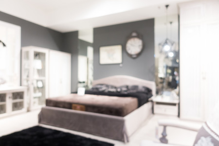 Abstract blur bedroom furniture shop and store interior for backgroundの写真素材