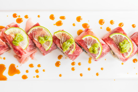 Selective focus point on Beef sushi in white plate - Japanese food styleの写真素材